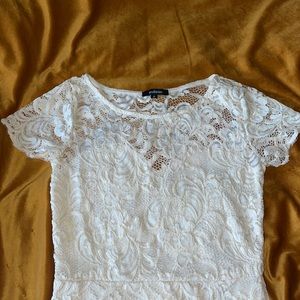 never worn, lacey white dress.